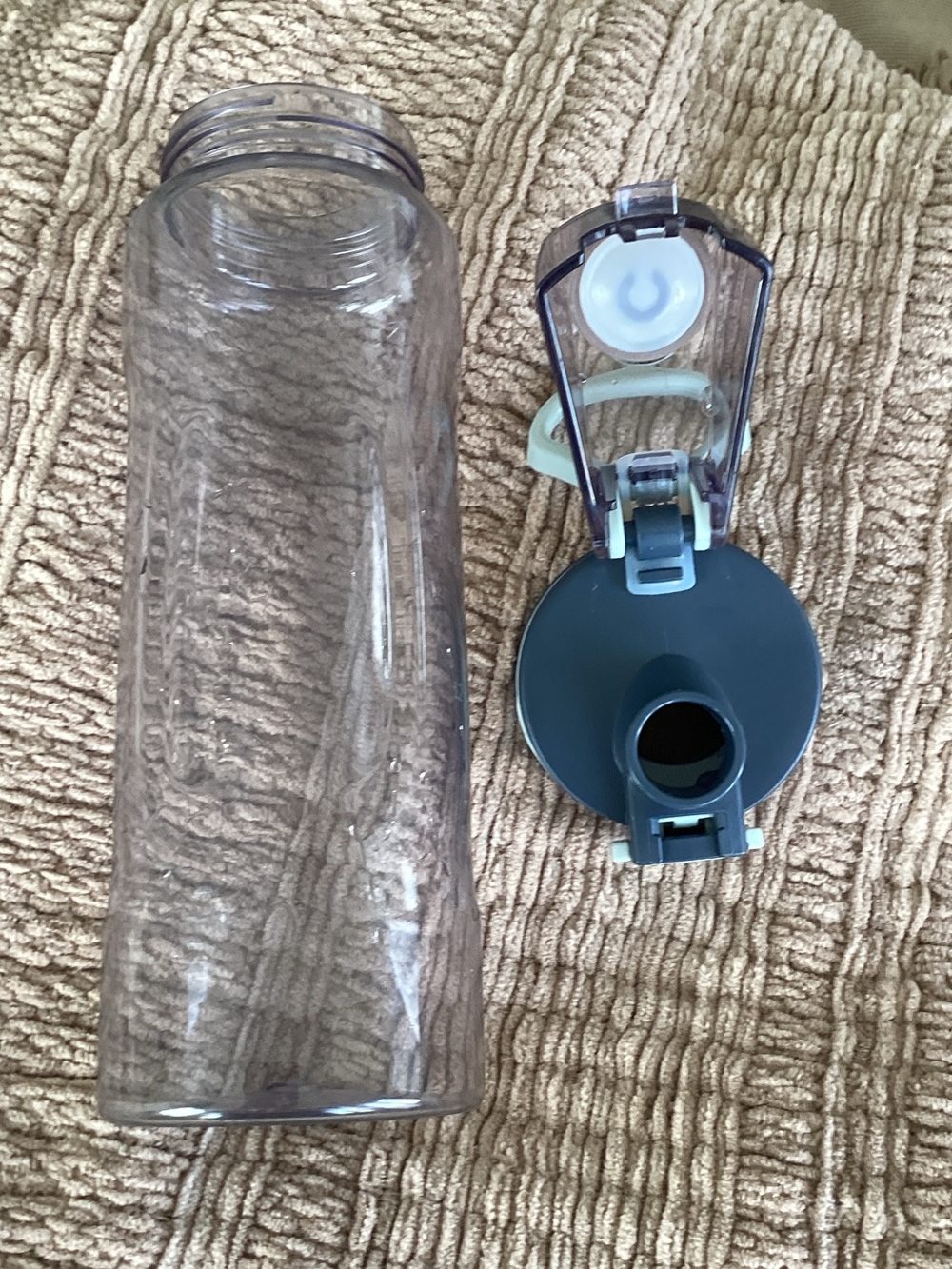 Clear Plastic Water Bottle with Dark Teal Flip Lid
